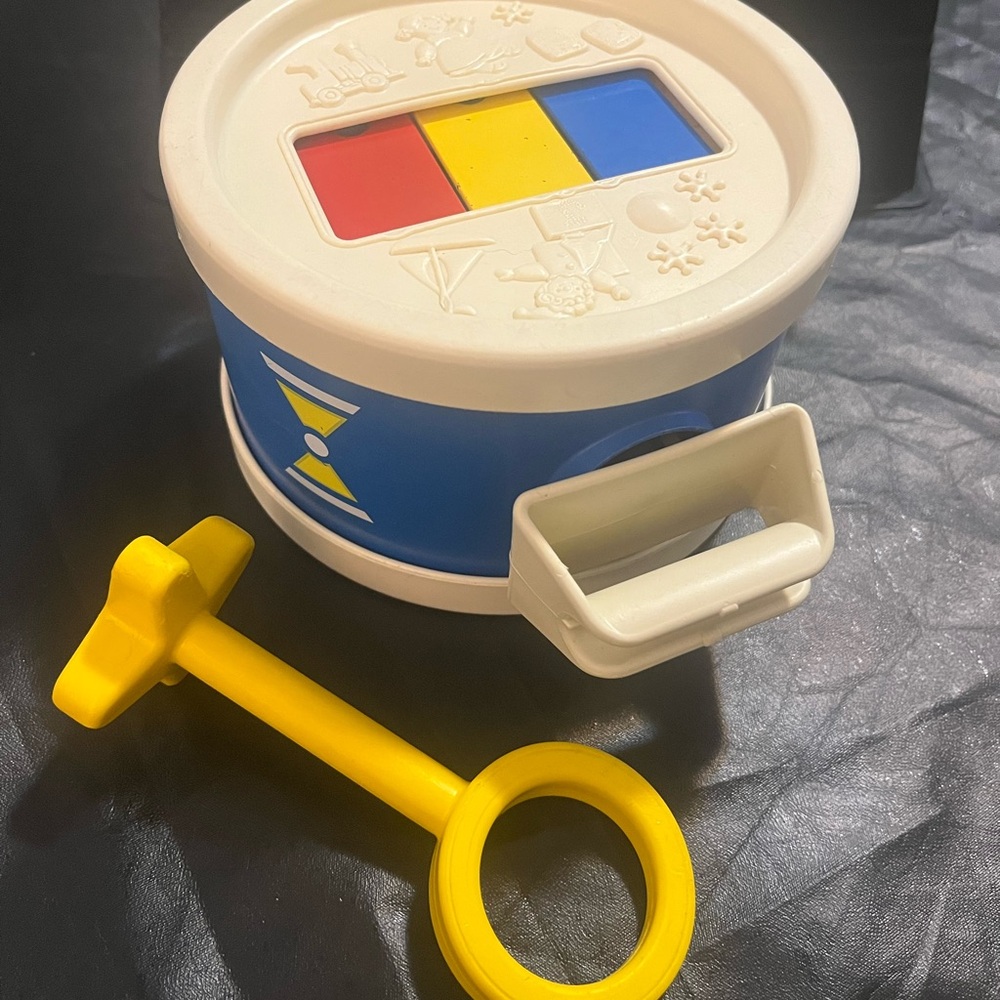 1976 Fisher-Price Plastic Drum and Xylophone with yellow Drumstick attached